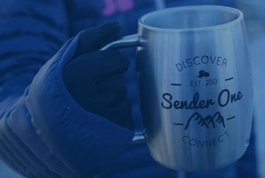Coffee mug with Sender One branding